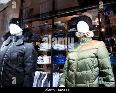 Manikins window display in retail clothing store Stock Photo