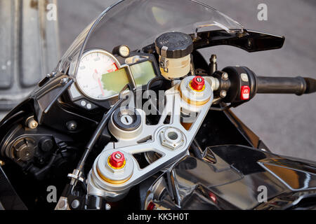 Steering wheel and dashboard of a modern sports motorcycle Stock Photo