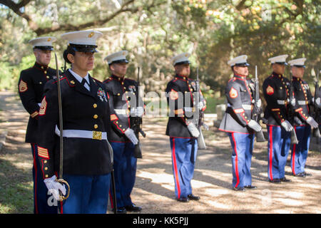 Marines with 1st and 2nd Platoon, Truck Company, 23rd Marine Regiment, 4th Marine Division, Marine Forces Reserve, present arms during the annual wreath laying ceremony for Gen. Robert H. Barrow, the 27th Commandant of the Marine Corps, at Grace Church of West Feliciana, in Saint Francisville, La., Nov. 10, 2017. The Marines performed a 21-gun salute, during the ceremony, to pay tribute to Barrow. (U.S. Marine Corps photo by Lance Cpl. Niles Lee/Released) Stock Photo