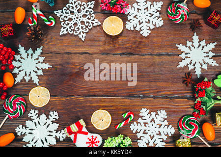 Christmas, New Year holiday cooking background. Ingredients, spices, dried  oranges and baking molds, Christmas decorations (balls, fir-tree branch, co  Stock Photo - Alamy