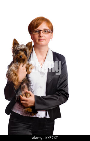 Business woman holding yorkshire terrier isolated on white Stock Photo