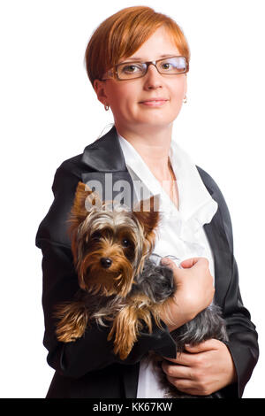 Business woman holding yorkshire terrier isolated on white Stock Photo