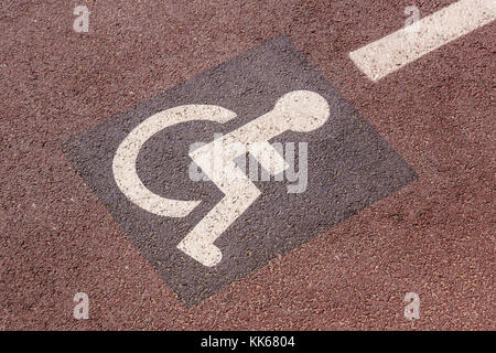 Way of wheel chair in the garden, disabled icon sign on the road in the public park Stock Photo