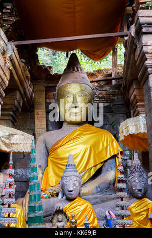 Buddha shrine and statue in the main temple on the upper terrace of the pre-Angkorian Khmer Hindu temple of Wat Phou, Champasak, Laos, southeast Asia Stock Photo