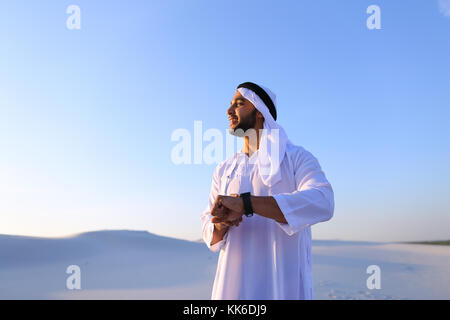 Portrait of handsome Arab businessman who experiencing new iWatc Stock Photo