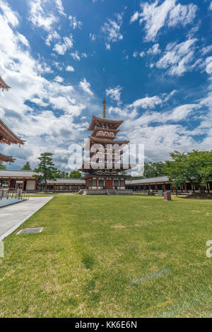 Nara - August 25, 2017 : Yakushi-Ji temple complex Saito (West Tower) three-story pagoda. Listed as UNESCO World Heritage Site, under the name of Hist Stock Photo