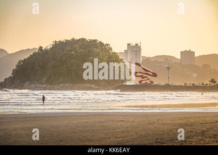 Santos Beach and Urubuquecaba island at sunset - Santos, Sao Paulo, Brazil Stock Photo