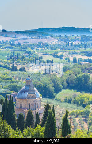 Tuscany Landscape, vineyards, olive groves, vineyards, and Cyprus trees with mountains in the background, a classic vista from Tuscany. Stock Photo