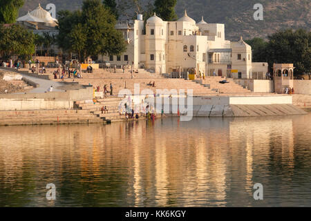 The sacred Lake at Pushkar is surrounded by bathing ghats and temples,Rajasthan,India Stock Photo