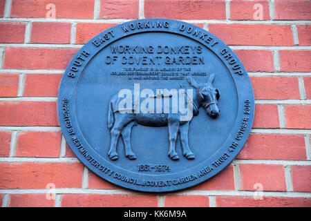 LONDON, UK - NOVEMBER 26TH 2017: A plaque commemorating the 100,000 Costermongers Donkeys that worked in Covent Garden Market, on 26th November 2017. Stock Photo