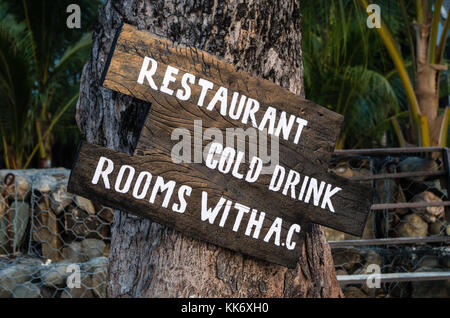 Sign RESTAURANT, COLD DRINK, ROOMS WITH AC Stock Photo