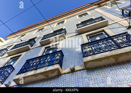 Lisbon windows with typical portuguese tiles on the wall Stock Photo