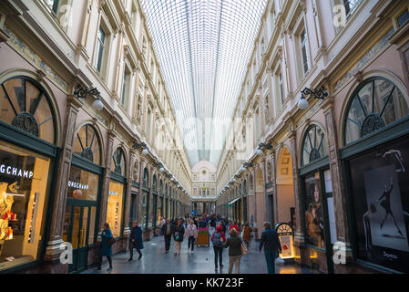 Brussels, Belgium - April 22, 2017: People shop in the historical Galeries Royales Saint-Hubert shopping arcades in Brussels Stock Photo