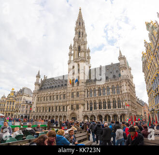 Brussels, Belgium - April 22, 2017: Many tourists visiting famous Grand Place - Grote Markt. It is the central square of Brussels. Grand Place was nam Stock Photo