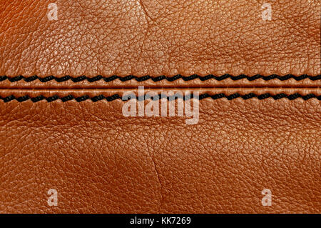 Macro brown leather with black stitching Stock Photo