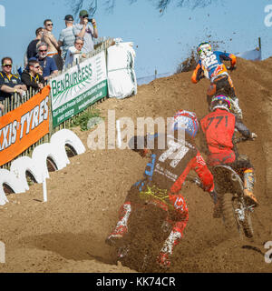 Spectators watching MX2 racers Sheridan, Meara and Maggio at the 2017 British Championship meeting at Cadders Hill, Lyng, Norfolk, UK. Stock Photo