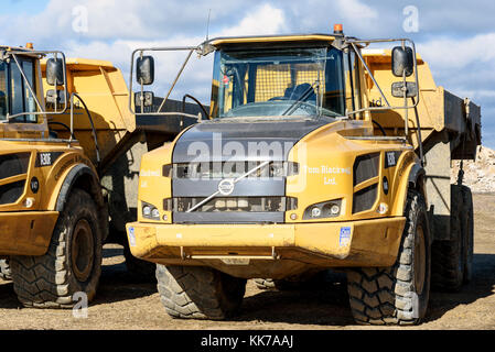 parked Volvo A30F earth moving machines at a local gravel pit in Essex Silver End England Stock Photo