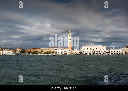 Storm light from the Guidecca Canal, Venice looking towards St Mark's Square, the Doge's Palace and the Campanile. Stock Photo