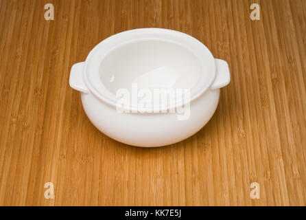 empty white pot on   bamboo countertops background Stock Photo