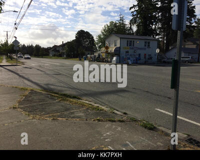 In 2018 WSDOT contractor crews will repave the highway and improve pedestrian crossings at some intersections, like this one, along the SR 20 Spur. SR 20 Spur12th Street repaving and ADA work 36940963402 o Stock Photo