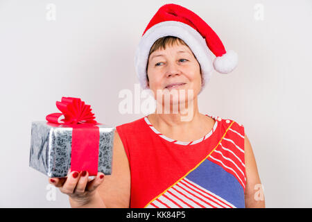 Excited Grandmother Receiving Christmas Gift From Granddaughter At Home  Stock Photo - Alamy