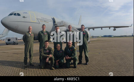 U.S. Air Force KC-135 Stratotanker aircrew, assigned to RAF Mildenhall, England, and Royal Air Force A330 Voyager aircrew stand in front of an RAF Voyager Nov. 1, 2017, on the flight line at RAF Brize Norton, England. The NATO allies executed the first KC-135 and RAF Voyager cell aerial refueling when two RAF Tornado GR4s received fuel off the east coast of Scotland. (U.S Air Force photo by Senior Airman Justine Rho) Stock Photo