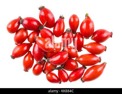 Small heap of beautiful red rose hips. Ripe medicinal rosehips scattered and isolated on white background. Stock Photo