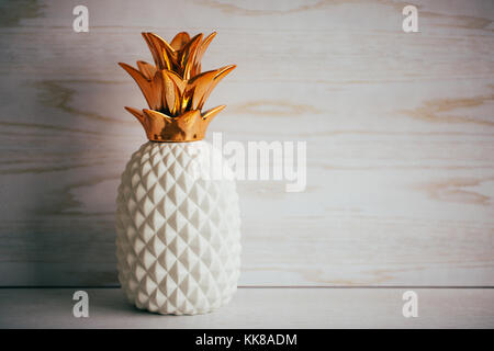 Decorative ceramic pineapple on white background Stock Photo