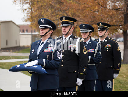 The Idaho National Guard held a Veterans Day Ceremony Nov. 8, 2017 at Gowen Field Memorial Park, Boise, Idaho. Idaho Air Guard Joint Force Headquarters Director of Staff, Col. Britt Vanshur spoke at the event which included the playing of taps, followed by a canon salute and an A-10 flyover from the 190th Fighter Squadron. (U.S. Air National Guard photo by Tech. Sgt. John Winn) Stock Photo