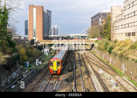 A Gatwick Express class 387 Electrostar train, built by Bombardier Transportation, leaving East Croydon station travelling south. Stock Photo