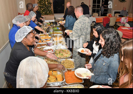 The 61st Air Base Group at Los Angeles Air Force Base hosted the annual Holiday Family Feast and special volunteer recognition held at the Fort MacArthur Community Center in San Pedro, Calif. Nov 16, 2017.     During the meal, Master Jerome Ginsberg was recognized for his 17 plus years working with military youth- dependents, as a martial arts instructor here at LA AFB, by the 61st Air Base Group Commander, Col Charles Roberts. (U.S. Air Force photo/Joseph M. Juarez Sr.) Stock Photo