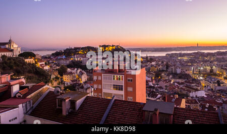LISBON, PORTUGAL - NOVEMBER 19, 2017: The cityscape of Lisbon, Portugal, by night, shortly after sunset on a November day. Stock Photo