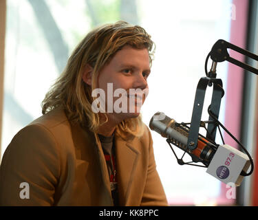 HOLLYWOOD, FL -  JANUARY 29: Jess Glenne and Conrad Sewell pose for a portrait at radio station 97.3 The Hits on January 29, 2016 in Hollywood, Florida.  People:  Conrad Sewell Stock Photo