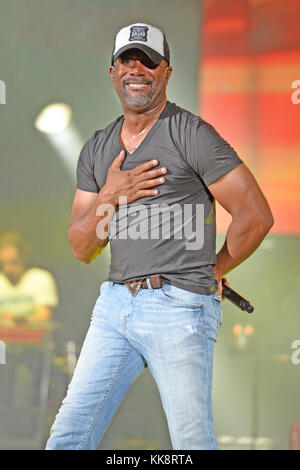 WEST PALM BEACH, FL - JUNE 04: Darius Rucker performs at The Perfect Vodka Amphitheater. Darius Carlos Rucker (born May 13, 1966) is an American singer and songwriter. He first gained fame as the lead singer and rhythm guitarist of the Grammy Award-winning rock band, Hootie & the Blowfish, which he founded in 1986 on June 4, 2016 in West Palm Beach Florida  People:  Darius Rucker  T Stock Photo