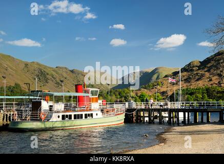 Ullswater, Cumbria, England. The lake passenger steamer boat landing pier at Glenridding. Looking south to the Patterdale fells Stock Photo