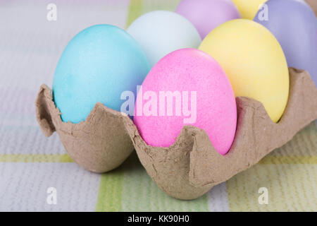 Closeup of colored Easter eggs in a carton Stock Photo