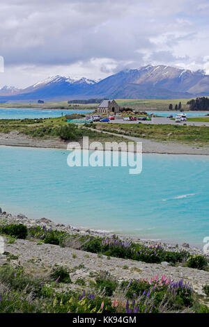 The Church of the Good Shepherd is situated on the shores of Lake Tekapo, It features an altar window that frames views of the lake and mountains Stock Photo