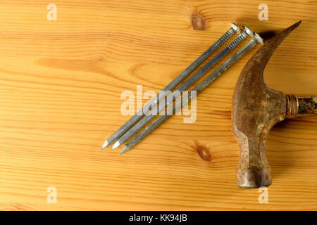 Hammer and nails top view with copy space. Stock Photo