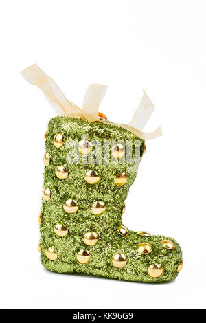Green and gold Christmas festive sock. Stock Photo