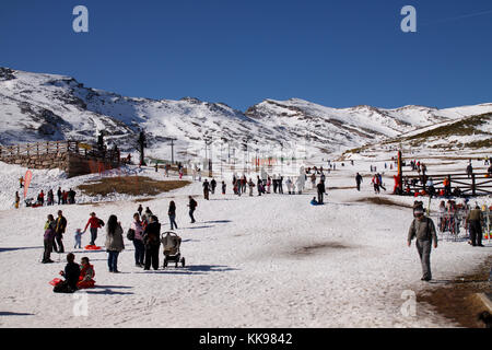 People enjoying a day off in the snow. Stock Photo