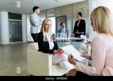 Picture of attractive saleswoman working in office Stock Photo