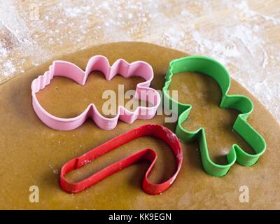 detailed shot of cookie cutters on gingerbread dough Stock Photo