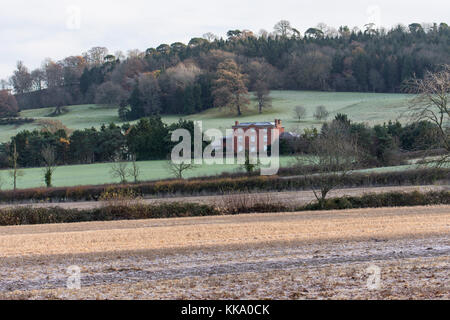 Traditional Cotswold farm house in winter Stock Photo