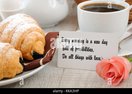Every morning is a new day full of possibilities. Do all things with love. Breakfast with motivational quote. Stock Photo