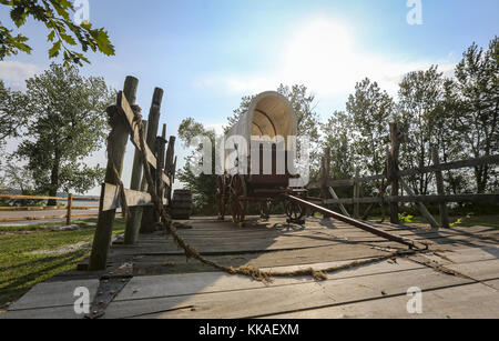 Nauvoo, Iowa, USA. 3rd Aug, 2017. A covered wagon is seen on display on a raft at the Pioneer Memorial point in Nauvoo, Illinois, on Thursday, August 3, 2017. Credit: Andy Abeyta, Quad-City Times/Quad-City Times/ZUMA Wire/Alamy Live News Stock Photo