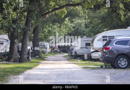 Port Byron, Iowa, USA. 2nd Aug, 2017. A number of campers vehicles are seen down a shoreline road at Camp Hauberg in Port Byron, Illinois, on Wednesday, August 2, 2017. Credit: Andy Abeyta, Quad-City Times/Quad-City Times/ZUMA Wire/Alamy Live News Stock Photo