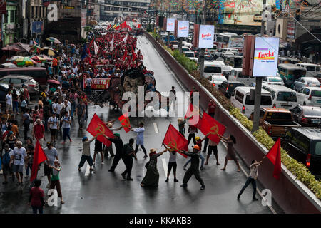 Philippines. 30th Nov, 2017. Activists marched towards Mediola, Manila on Andres Bonifacio's 154th birth anniversary. The protesters burned an effigy of President Duterte with U.S. president Trump on its shoulder. Credit: J Gerard Seguia/ZUMA Wire/Alamy Live News Stock Photo