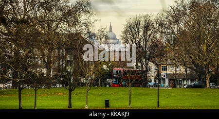 Peckham, London, UK. 30th Nov, 2017. The dome of St Paul's Cathedral viewed through the trees from Peckham Rye Park in South London, Credit: David Rowe/Alamy Live News Stock Photo