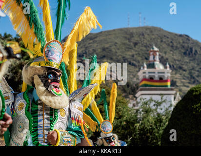 Masked dancer in traditional costume, Fiesta de la Virgen de la Candelaria, Copacabana, La Paz Department, Bolivia, South America Stock Photo
