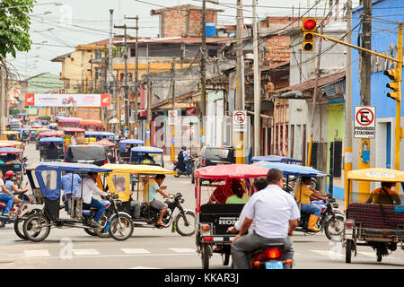 Mototaxis in a busy street in Iquitos, Peru, South America Stock Photo